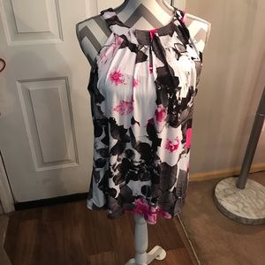 INC top.   Has a build bra.  Never worn